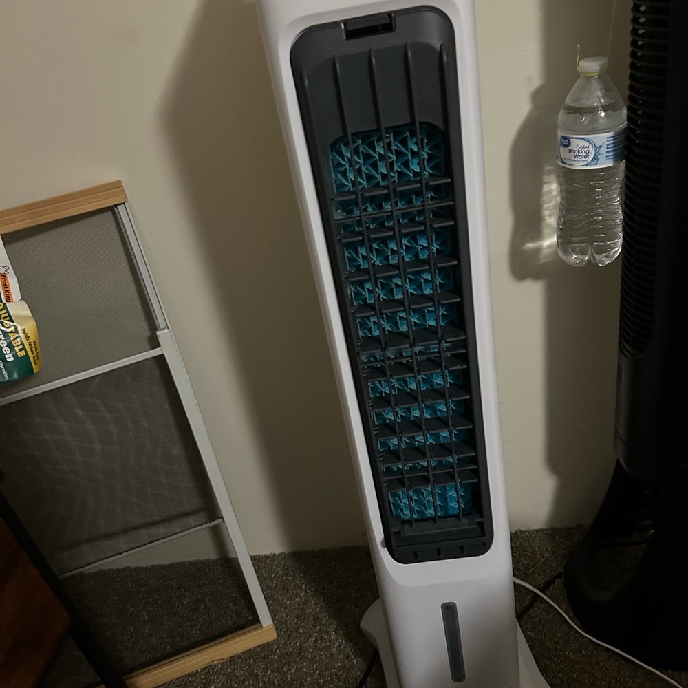 Sleek White and Gray Tower Fan with Blue Details